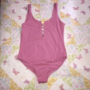 Pink body suit